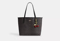 Coach Bolso City Tote en lona de la firma