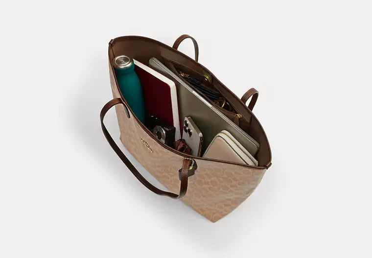Coach Bolso City Tote en lona de la firma