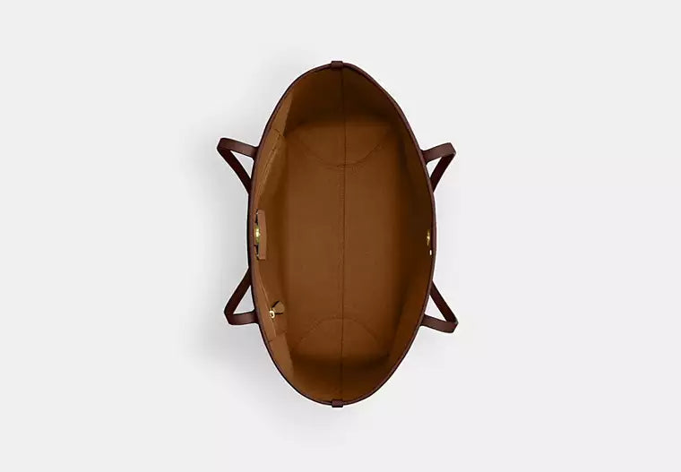 Coach Bolso City Tote en lona de la firma