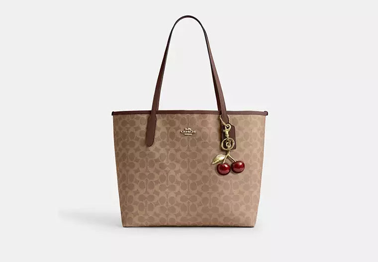 Coach Bolso City Tote en lona de la firma