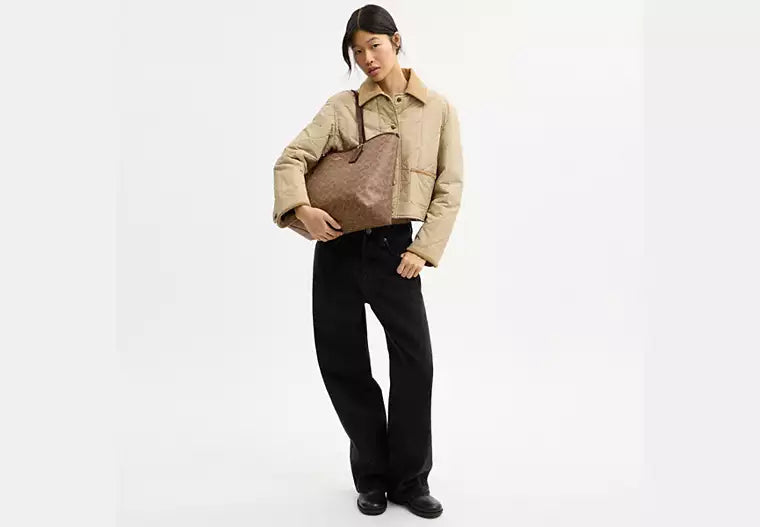 Coach Bolso City Tote en lona de la firma