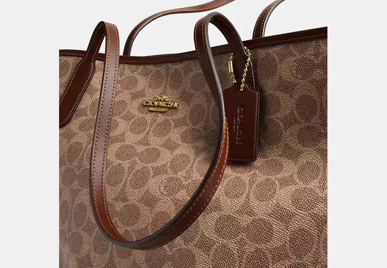 Coach Bolso City Tote en lona de la firma