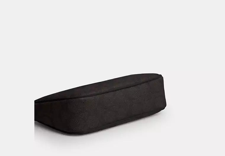 Coach Nolita 19 en lona de firma