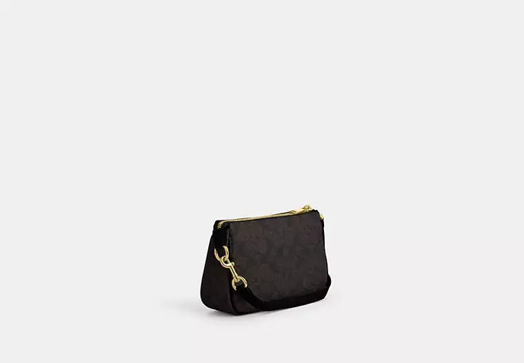 Coach Nolita 19 en lona de firma