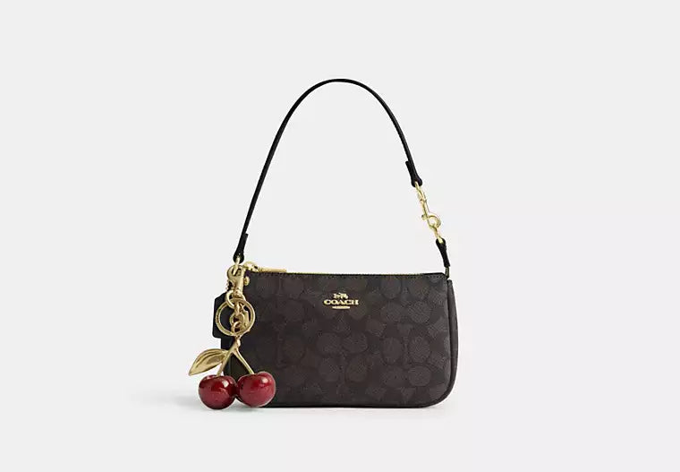 Coach Nolita 19 en lona de firma