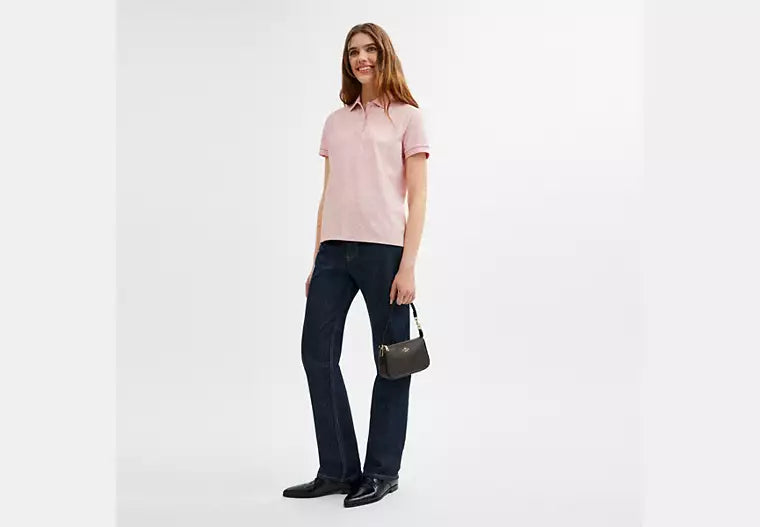 Coach Nolita 19 en lona de firma