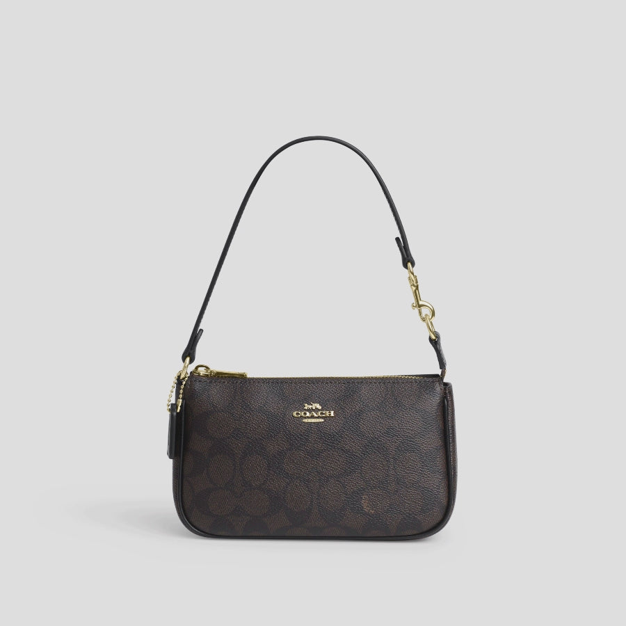 Coach Nolita 19 en lona de firma